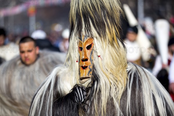 Participants take part in the International Festival of Masquerade Games Surva. The festival promotes variations of ancient Bulgarian and foreign customs and masks