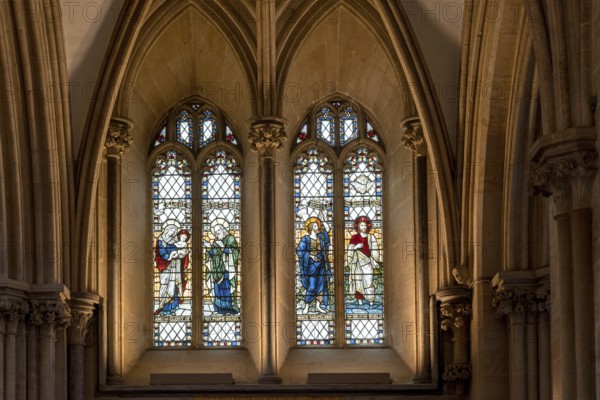Wells, United Kingdom, 1 September, 2022: close-up view of a stained glass window inside the historic Wells Cathedral