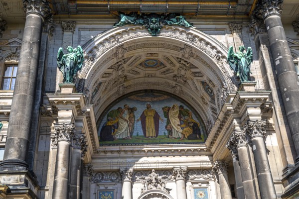 Artistic portal of the Berlin Cathedral, a popular sight in the capital and a historic building. The main entrance of the famous church Berlin Cathedral