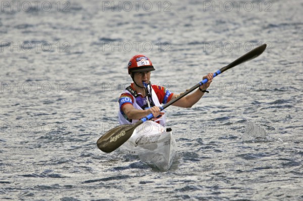 Craig Nieper competing in the kayaking leg of the Coast to Coast triathlon, West Coast, South Island, New Zealand, 2011