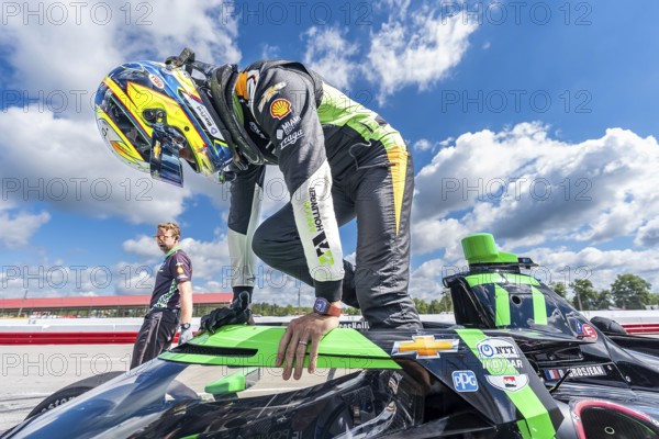 ROMAIN GROSJEAN (77) of Geneva, Switzerland prepares to practice for the Honda Indy 200 at Mid-Ohio Sports Car Course in Lexington, OH
