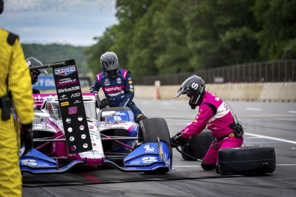 Felix Rosenqvist (60) of Varnamo, Sweden comes down pit road for service during the XPEL Grand Prix at Road America in Elkhart Lake, WI