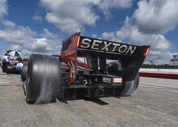 SANTINO FERRUCCI (14) of Woodbury, Connecticut prepares to practice for the Honda Indy 200 at Mid-Ohio Sports Car Course in Lexington, OH