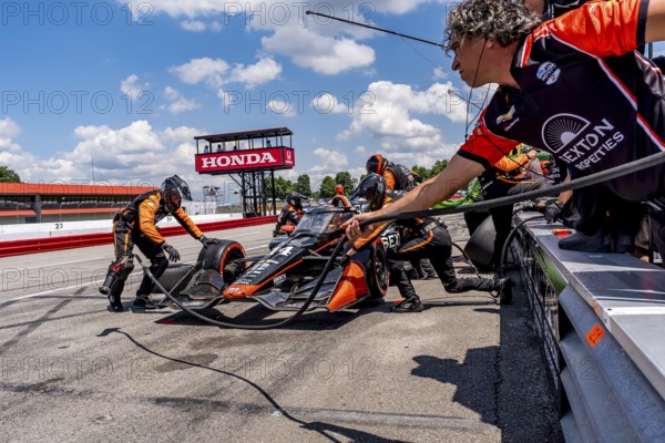 SANTINO FERRUCCI (14) of Woodbury, Connecticut comes down pit road for service during the Honda Indy 200 at Mid-Ohio Sports Car Course in Lexington, OH
