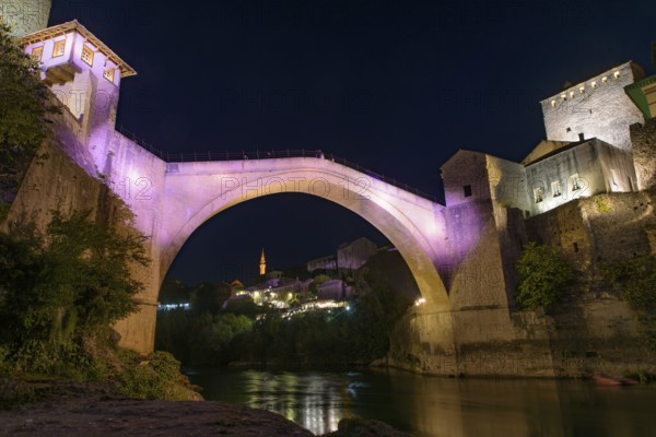 Mostar Bridge at night, an Ottoman bridge in Mostar, Bosnia and Herzegovina