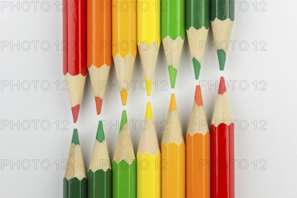 Conceptual crayons represented as successor double energy label colors