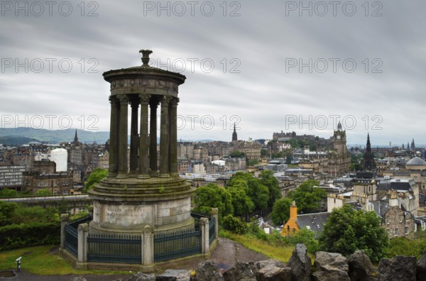 Edinburgh, Scotland, July 9 2019: The skyline of the city of Edinburg the capital of Scotland from the Calton Hill with the Nelson Monument