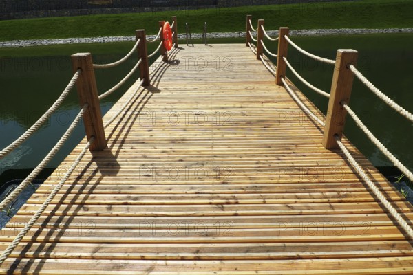 Deck on swimming pool in nature