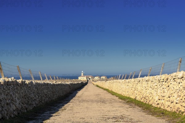 The long gravel road leading to the lighthosue at Punta Nati on Menoorca Island