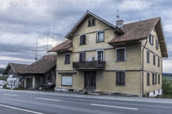 Exterior view with outbuildings of the former Brunner staff house which has since been demolished, Honau, Lucerne, Switzerland