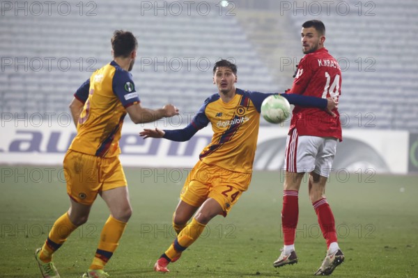 Sofia, Bulgaria - 9 December, 2021: Kaloyan Krastev of CSKA Sofia (R) in action against players of AS Roma during the UEFA Europa Conference League group C soccer match between CSKA Sofia and AS Roma