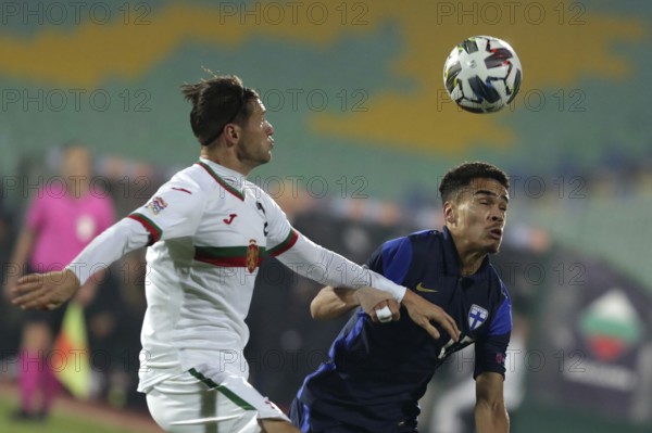 Sofia, Bulgaria - 15 November, 2020: Bulgaria's Strahil Popov (L) in action with Finland's Pyry Soiri (R) during the UEFA Nations League group stage, League B, Group 4 match between Bulgaria and Finland, Sofia, Bulgaria