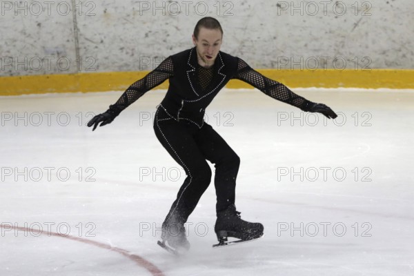 Sofia, Bulgaria - 28 February, 2021: Larry Loupolover of Bulgaria performs during the senior men free skating category of Sofia Trophy International Figure Skating Competition, Sofia, Bulgaria