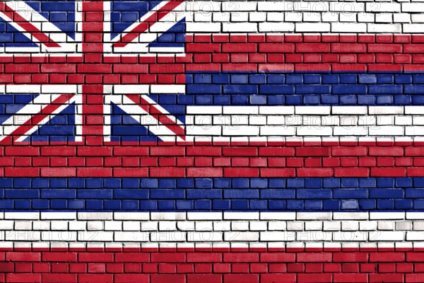 Flag of Hawaii painted on brick wall