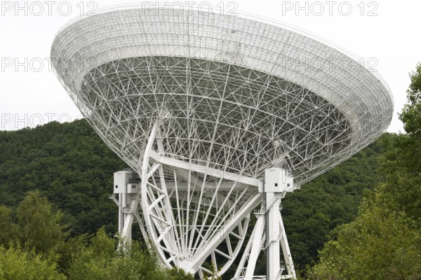 The photo shows a radio telescope