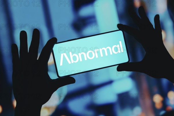 In this photo illustration, the Abnormal Security logo is displayed on a smartphone screen