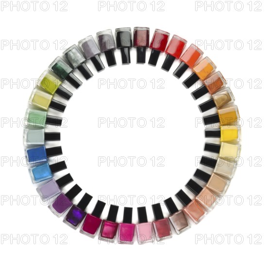 Nail polish colorful bottles circle isolated on white