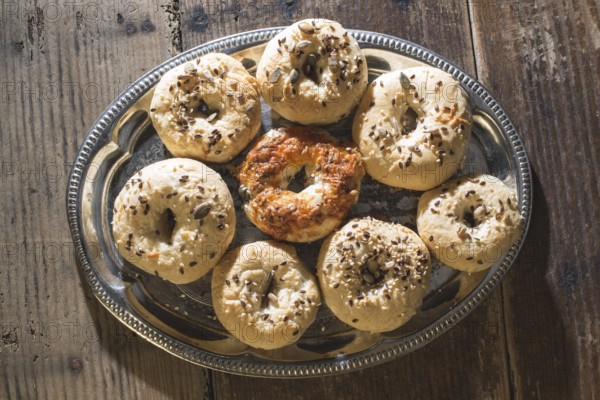 Bagels on a vintage table. Old vintage pan