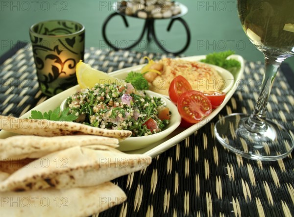 Tabbouleh with hommus and lemon chick peas with fresh pita bread