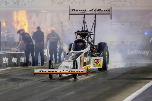 Sep 22, 2023-Concord, NC: NHRA Top Fuel Dragster Series driver, Clay Millican, runs down the lane during a qualifying session for the Betway Carolina Nationals