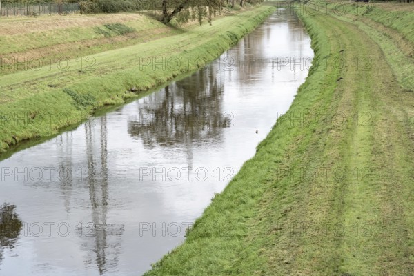 Sewer in a green industrial landscape