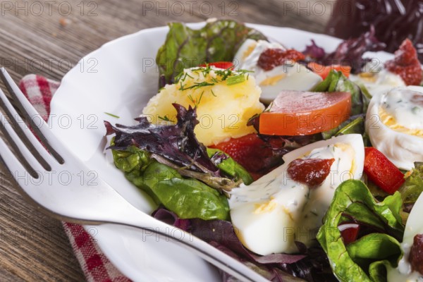 Salad with boiled egg