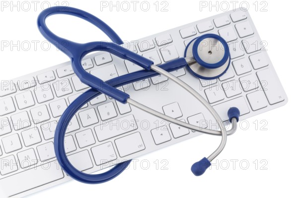 Stethoscope and keyboard of a computer, symbolic photo for diagnostics and appointment management Austria