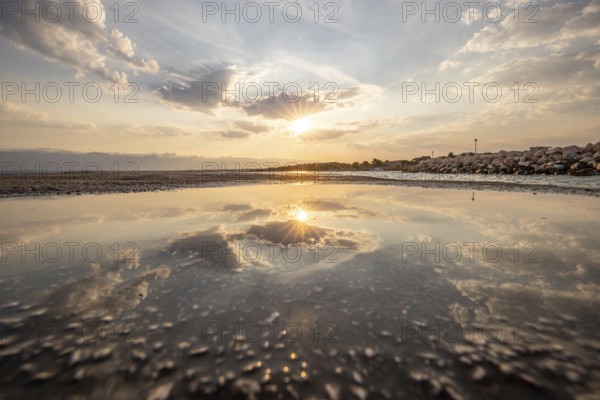 Bay with a small jetty or pier in the morning. Beautiful sunrise on the Mediterranean. Mediterranean coast and landscape beach Plaža Loziceder. Island of Vir, Zadar, Dalmatia, Adriatic Sea, Croatia