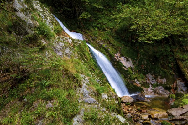 Picturesque high-water cascading waterfall Allerheiligen. The Black Forest /Schwarzwald/ - famous forest in the center of Europe. Germany. Autumn cloudy day