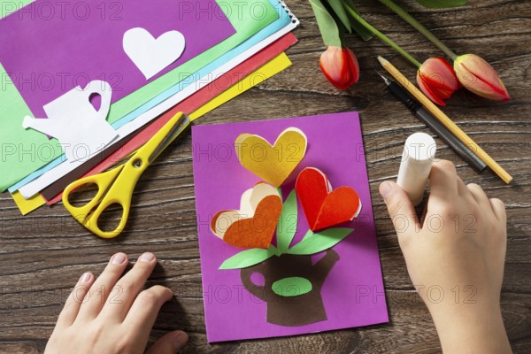 Instructions, step 8. Greeting card with bouquet flowers tulips on Mother's Day. Children's art project, craft for children. Handmade. Craft for kids