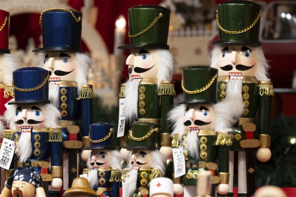 Detailed nutcrackers in a festive atmosphere, traditionally used as Christmas decorations at a Christmas market, Cologne, North Rhine-Westphalia, Germany