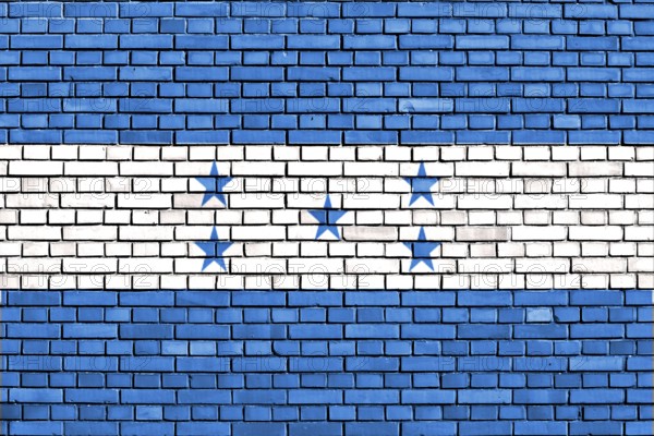 Flag of Honduras painted on brick wall