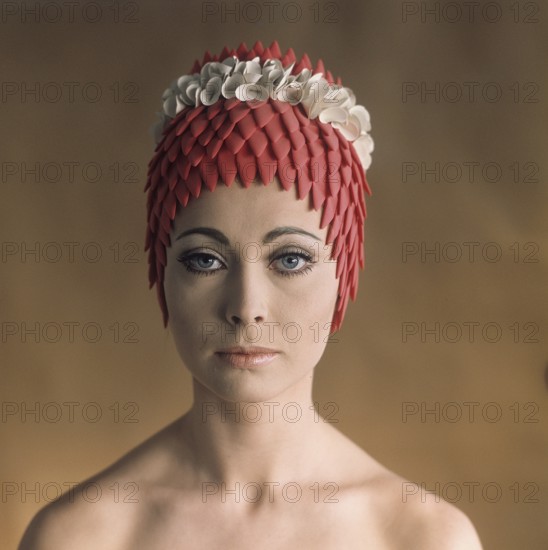 Monica Rågby. Swedish photo model. Born November 10, 1942. She won the Miss Sweden beauty pageant in 1962 and in 1963 she was chosen as Miss United Nations. Here in a period-typical 1960s swimming cap in plastic material. 1965