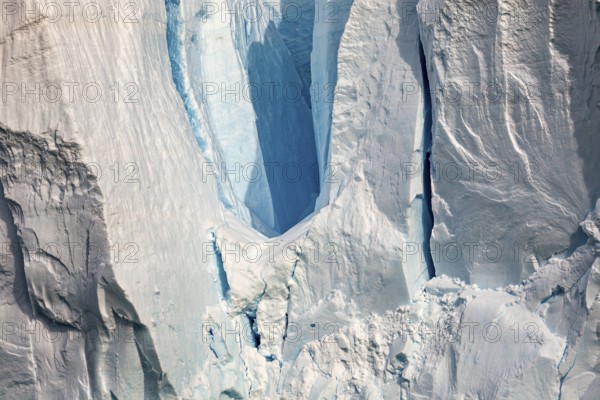 Close-up of a glacier with impressive ice formations and cool blue tones, The eternal ice of Antarctica