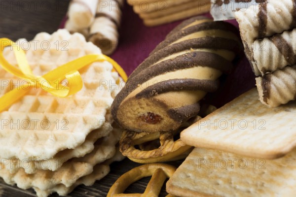 Cookies and biscuits for celebration on wooden table