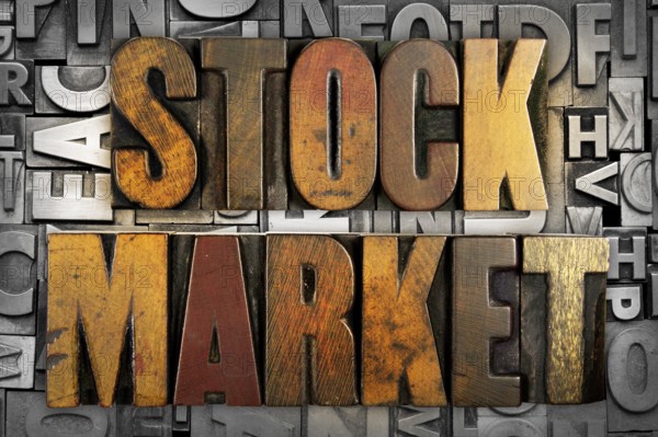 The words STOCK MARKET written in vintage letterpress type
