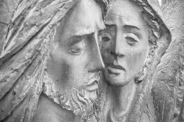 Bas-relief in bronze representing The Pity of Michelangelo. Faces of Holy Mary mother and Jesus Christ after the Crucifixion