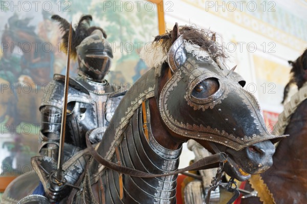 ST. PETERSBURG - JUNE 30, 2011: One of knights mannequins on horses at Knights Hall of the Hermitage. It hosts a part of the Hermitage Arsenal collection