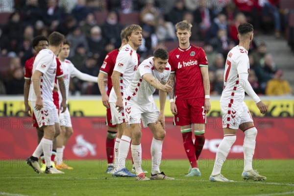 (DFL/DFB REGULATIONS PROHIBIT ANY USE OF PHOTOGRAPHS AS IMAGE SEQUENCES AND/OR QUASI-VIDEO) Cologne, RheinEnergieStadion, North Rhine-Westphalia, Eric Martel (1.FC Köln, midfield, #6), Josh Knight (defence, Hannover 96, #2), Leart Pacarada (1.FC Köln, defence, #17), 2nd Bundesliga, 1.FC Köln, Hannover 96 on 30.11.2024 at RheinEnergieStadion in Cologne Germany