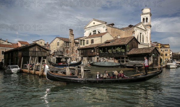 Italy Venice Gondola shipyard -453 one of the last in Venice rear Church of San Sebastiano 1505-46 built by Antonio Abondi