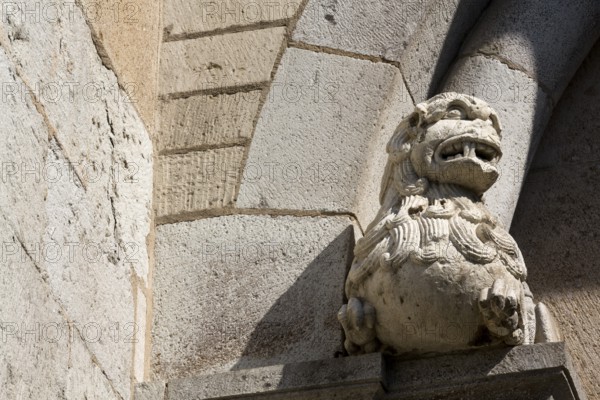 Romanesque lion, Saint, Saint