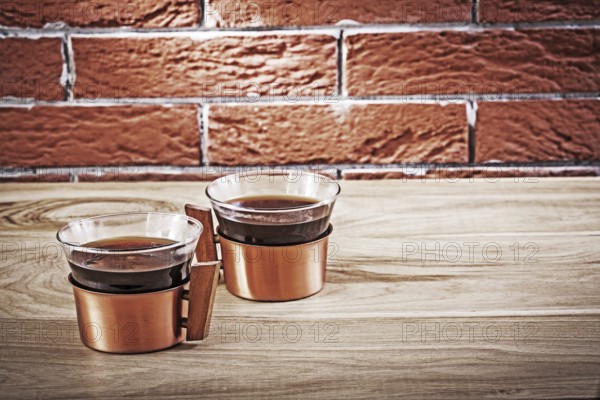 Two copper coffe cups in vintage interior