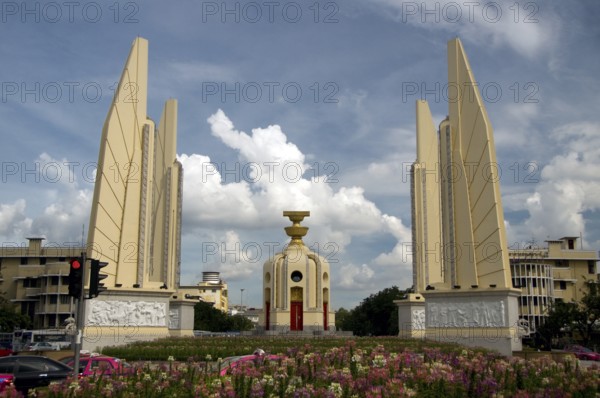 Thailand's Democracy Monument was commissioned in 1939 to commemorate the 1932 Siamese coup d'état which led to the establishment of a constitutional monarchy in what was then the Kingdom of Siam, by its military ruler, Field Marshal Plaek Pibulsonggram