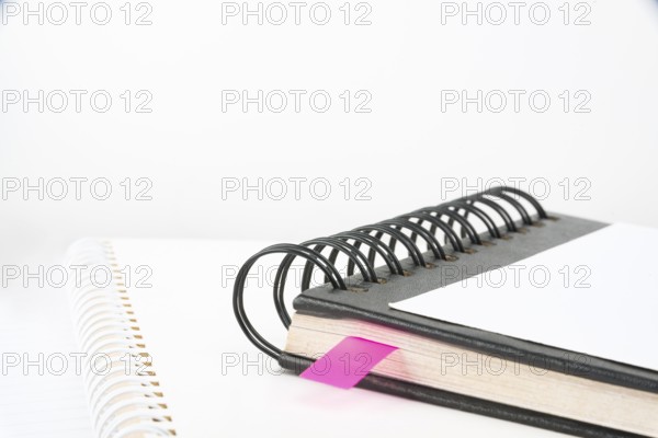 Blank Opened Spiral Notebook Placed On A Table Showing New Ideas
