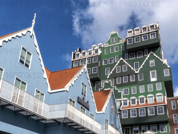 Detail of modern green hotel building as with many stacked small traditional buildings of Inntel Hotels Amsterdam Zaandam in a modern part of the city centre, Zaandam, North Holland, Netherlands