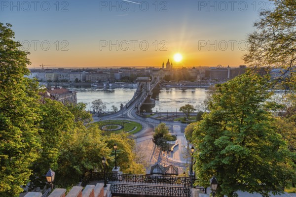 Budapest Hungary, sunrise city skyline at Danube River with Chain Bridge and St. Stephen's Basilica