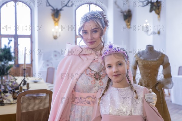 Nine-year-old Lisa from Dresden is the 1.5 millionth visitor to the Cinderella exhibition at Moritzburg Castle. Together with her family, she came to the castle on 1 February 2025 to try on costumes and see Cinderella's horse. The castle director of Moritzburg Castle, Dr Dominique Fliegler, surprised her together with Cinderella actress Tamara Kretschmer, presented her with a gift and flowers, Moritzburg, Saxony, Germany
