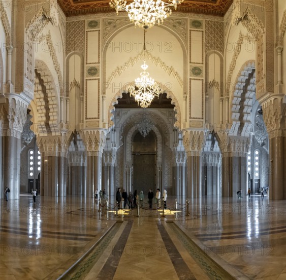 Casablanca, Morocco, 29 March, 2024: tourists enjoying a visit and guided tour of the Hassan II Mosque in downtown Casablanca