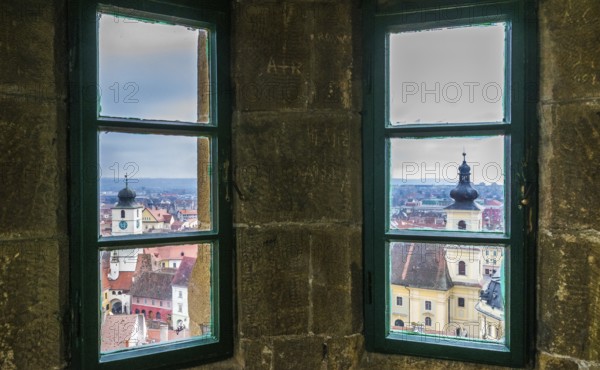 Sibiu Council Tower and Holy Trinity Roman Catholic Church viewed from the Evangelical Church