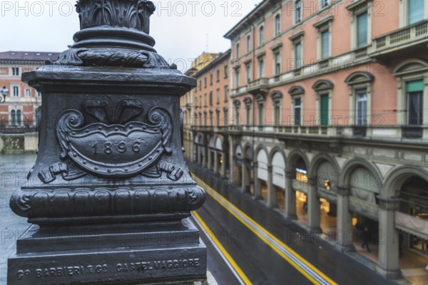 Via dell'Indipendenza street in Bologna, Italy, street lamp detail